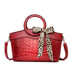 Audrey - Women's Croc-Embossed Round Handle Handbag